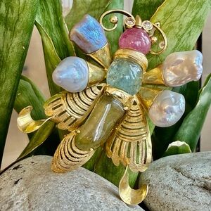 18 karat gold, butterfly, pearl, diamond, tourmaline, and aqua